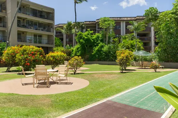 Outdoor dining area and shuffleboard court.