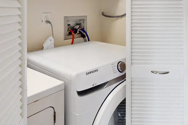 Convenient downstairs washer and dryer keep vacation essentials fresh throughout every stay