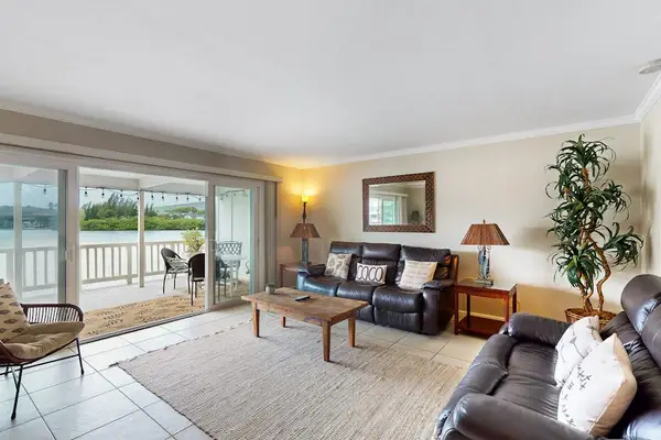 Living room opens directly onto the balcony for effortless indoor-outdoor relaxation together