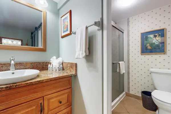 Freshen up comfortably in this bright and convenient bathroom space