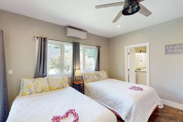 Comfortable Guest Bedroom With Tropical Charm
