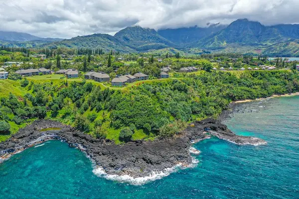 Spectacular Coastal Cliffs And Emerald Shores