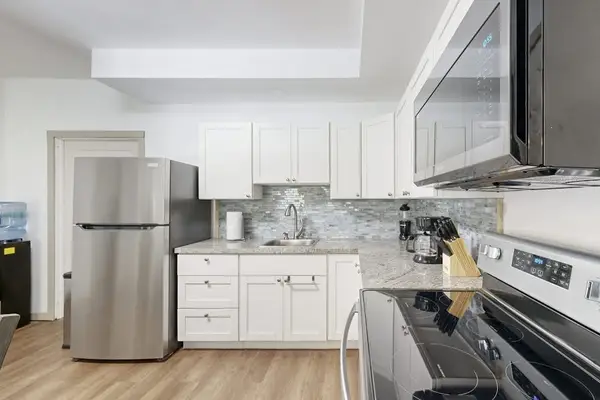 Prepare your favorite meals with ease in a fully equipped kitchen designed for your convenience.