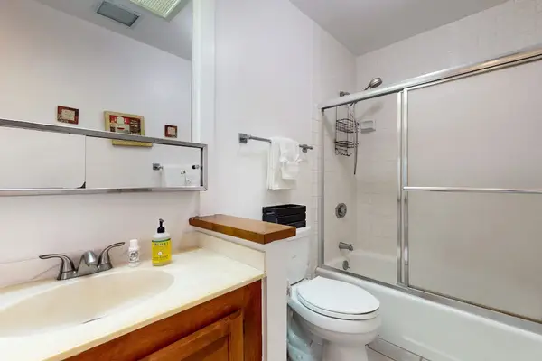 Full Bathroom With Tub And Shower