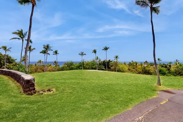 Lush Oceanfront Lawn And Walking Path