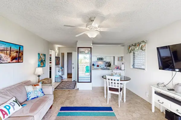 Spacious Living Room With Island Charm