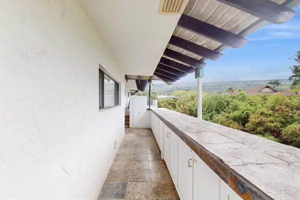 Covered walkway offers ocean views shaded passage and resort access