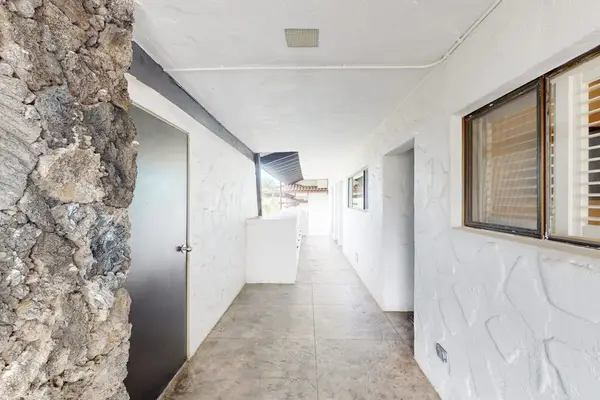 Comfortable full bathroom includes shower vanity mirror and bright finishes