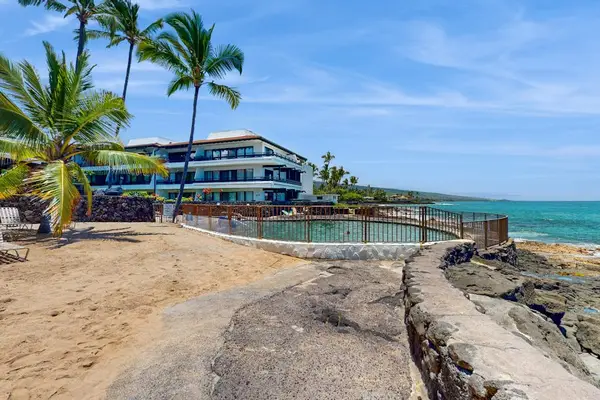Stunning lagoon-style pool offers refreshing swims beside ocean views nearby