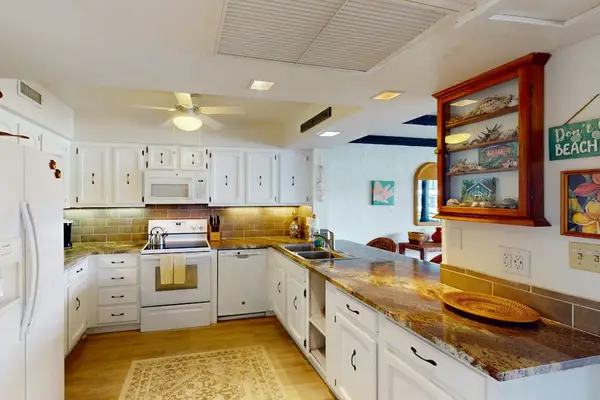 Fully Stocked Kitchen with Built-In Microwave & Dishwasher