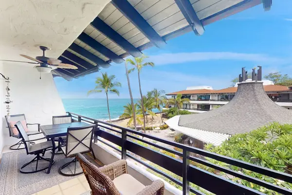 Spacious dining area offers island views seating and natural light