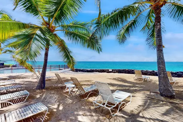 Private Oceanfront Beach Area with Loungers & Palm Shade