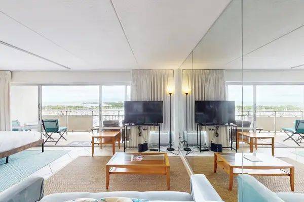 Marina views bring peaceful moments to the comfortable living room every afternoon