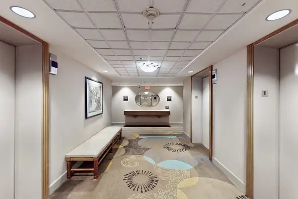 Elevators with convenient washer/dryer and trash rooms just steps away always