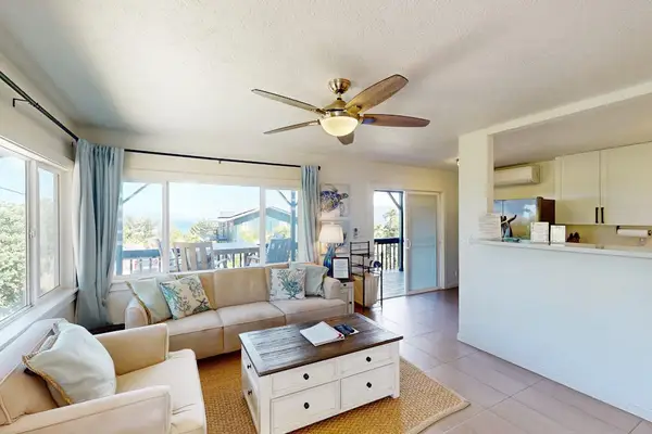 Bright Living Room With Island Views