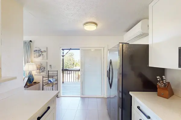 Bright And Fully Equipped Kitchen