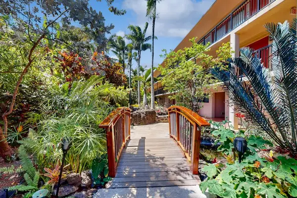 Peaceful courtyard with lush tropical gardens