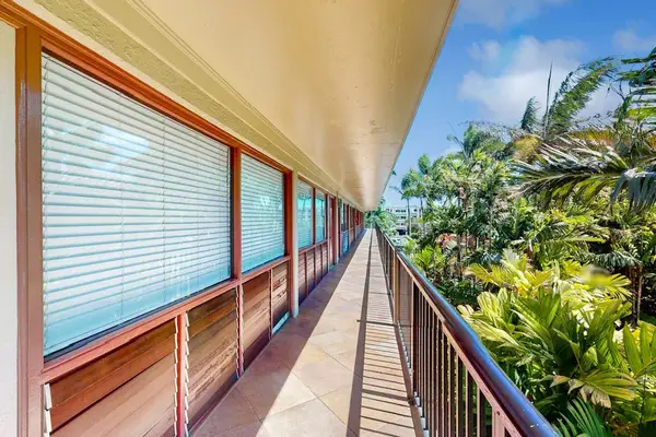 Private lanai overlooking lush tropical greenery