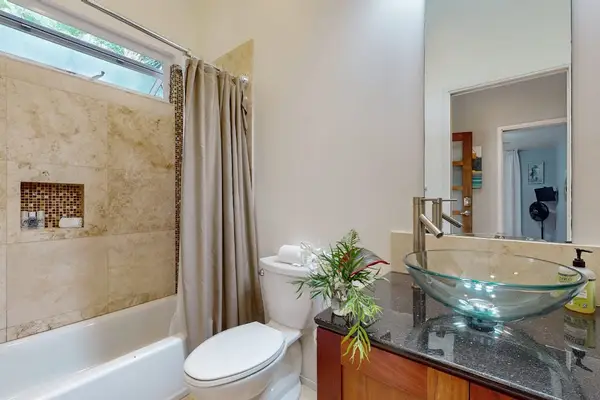 Full bathroom with a relaxing bathtub
