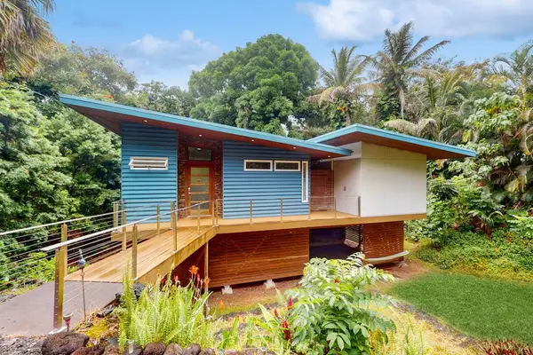 Peaceful retreat nestled in lush tropical surrounding
