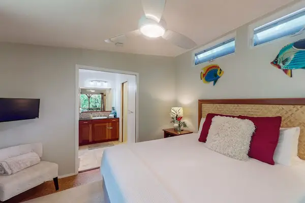 Spacious primary bedroom with a private ensuite bathroom