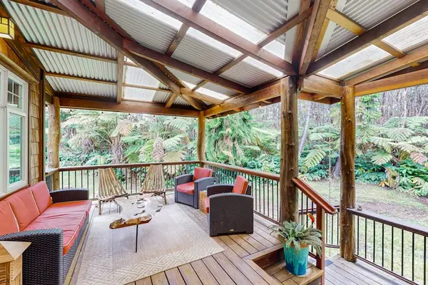 Relax on the covered lanai surrounded by nature