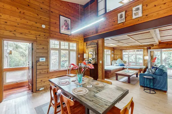 Open-concept living space with cozy fireplace