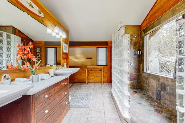 Spa-inspired bathroom with dual vanities
