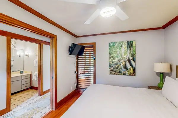 Master bedroom with king bed for a great nights sleep and a flat screen tv.