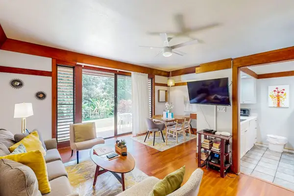 Living room with a comfortable sofa bed for any extra company and a flat screen tv.