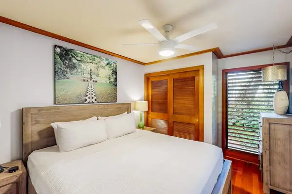 Master bedroom with king bed for a great nights sleep and a flat screen tv.