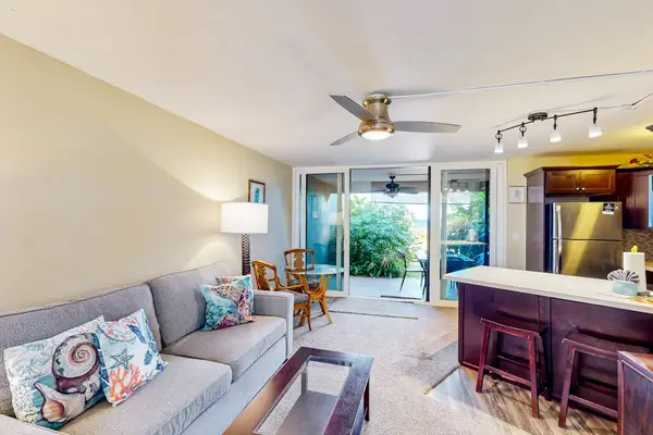Bright Coastal Living Room With Garden Access