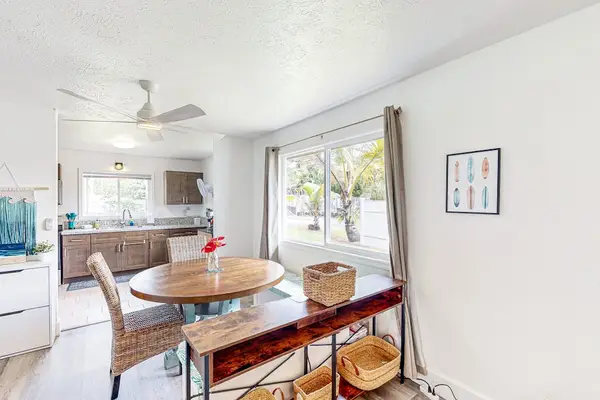 Dining room table with a view out of your tropical paradise.