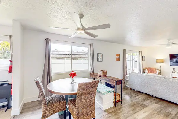 Dining room table with a view out of your tropical paradise.
