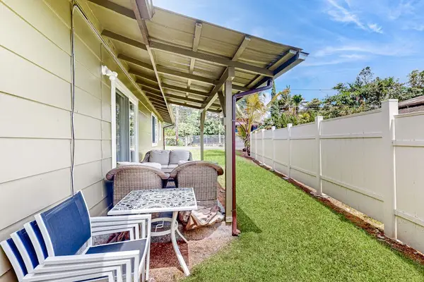 Backyard with very fence for extra privacy.