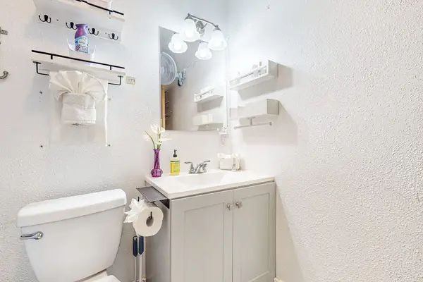 Guest bathroom with tub/shower combo.