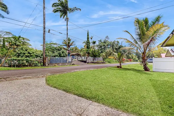 Escape to a private tropical oasis surrounded by lush Hawaiian landscaping, swaying palms, and the peaceful beauty of paradise.