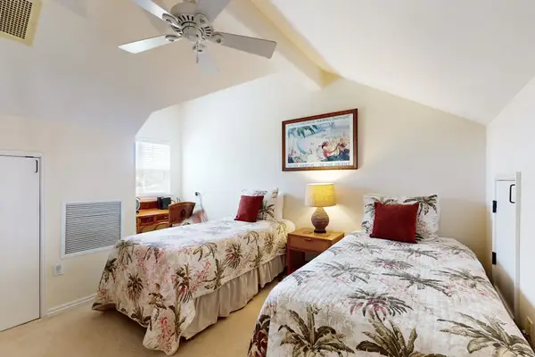 Spacious Bedroom with Two Beds & Vaulted Ceilings
