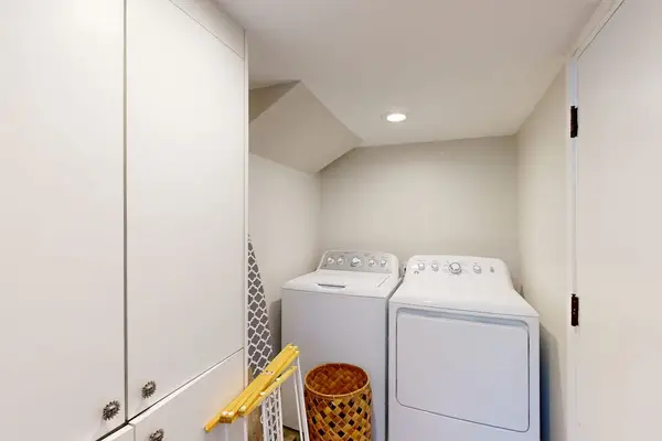 Washer and dryer conveniently located just off the kitchen for easy access