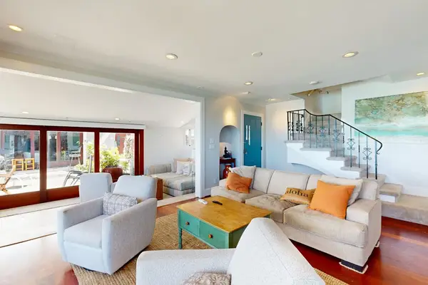 Enjoy uninterrupted water views from the bright and spacious living room daily