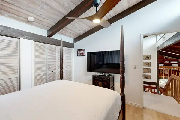 End the day comfortably in this inviting queen bedroom with a Smart TV.