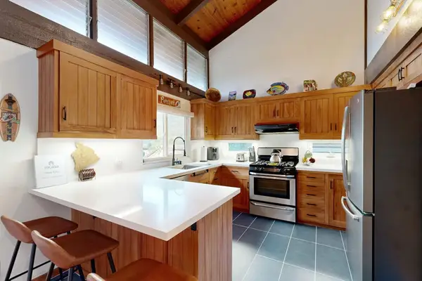 Prepare meals with ease in this full kitchen, ready for everything from breakfast to dinner.