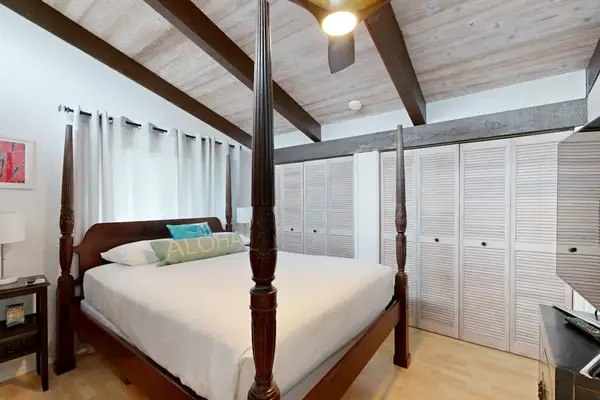 Unwind in a romantic four-poster setting filled with classic character and warmth.