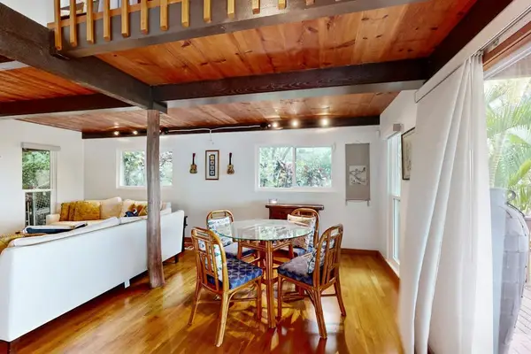 Share meals and conversations in this welcoming dining space with a seamless flow.