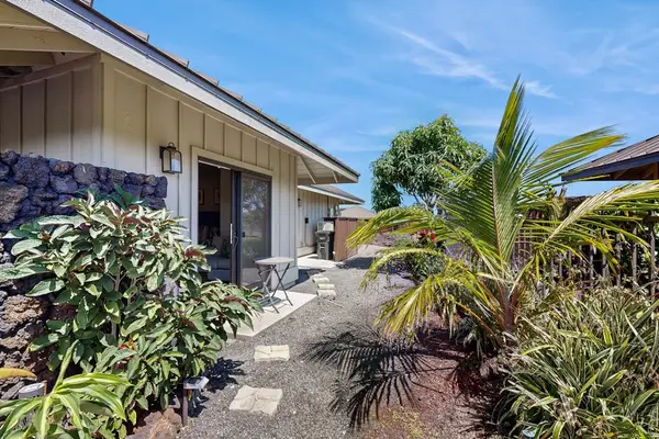 Side Pathway with Tropical Landscaping & Patio Access