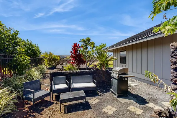 Private Gravel Patio with Outdoor Seating & Gas BBQ Grill