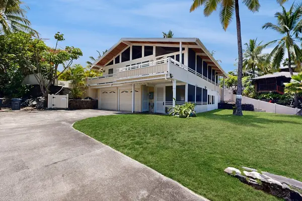 Front Exterior with Paved Driveway & Multi-Car Garage