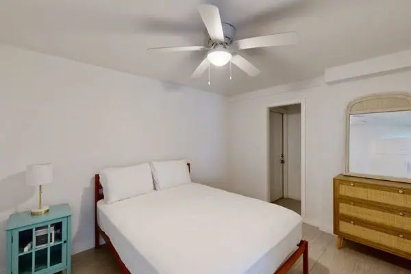 Island Queen Sanctuary with Dresser & Ceiling Fan