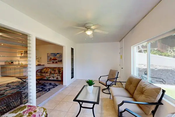 Covered Lanai Lounge with Glass Coffee Table