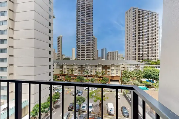 Take in the beauty of the city skyline from this comfortable balcony space.